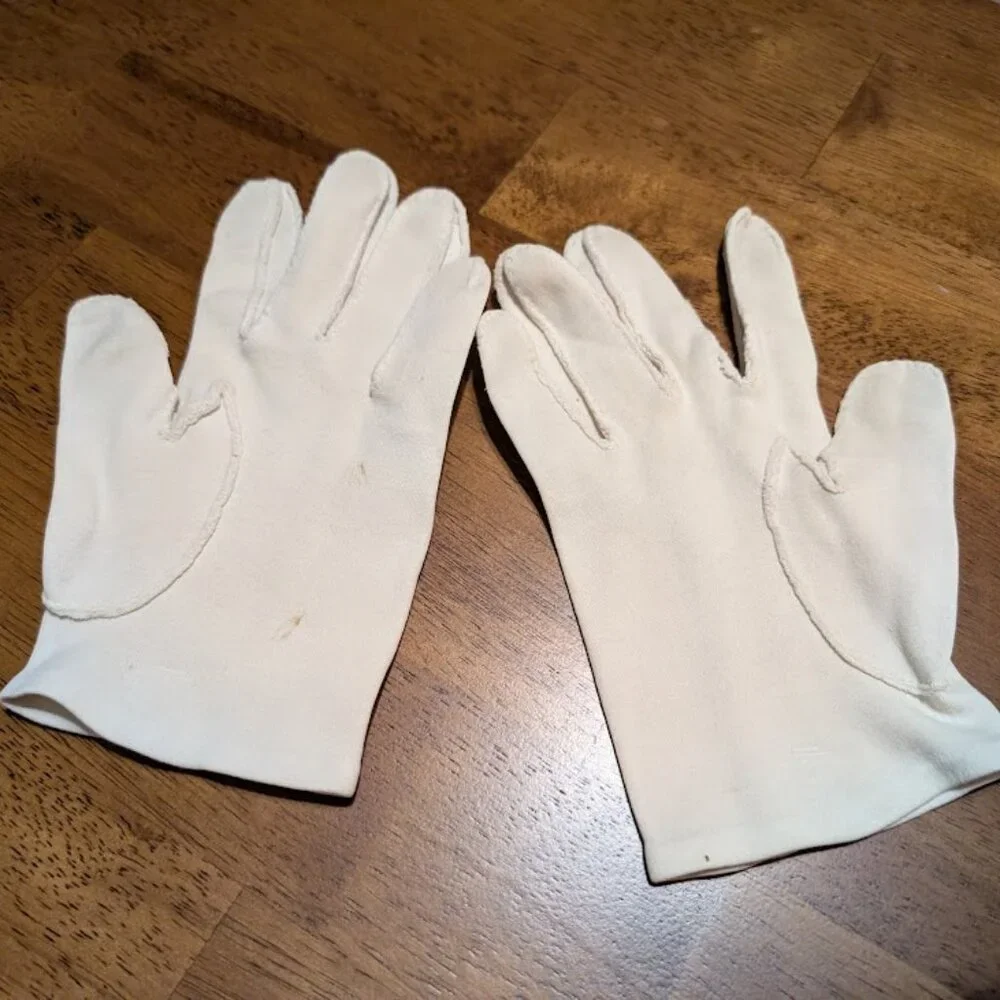 Vintage white wrist length cotton gloves embellished with delicate white buttons